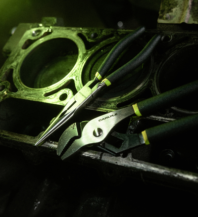 Close-up of tools on an engine block